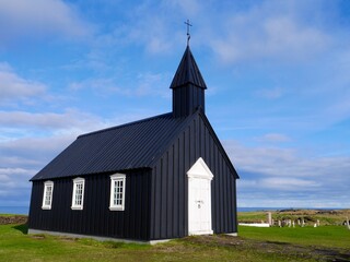 Fototapeta na wymiar Black church in Budir, Budakirkja. Snaefellsnes Peninsula, Iceland.