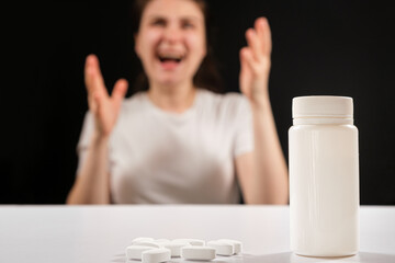 Tired aggressive woman screams, sedative dietary supplements and treatment for irritability.