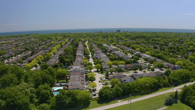 4K Aerial view of neighborhood in Burlington Ontario on a sunny summer day.