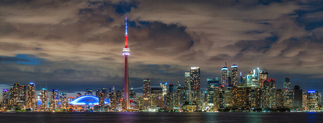 Panoramic view of Toronto skyline at night in Toronto, Ontario, Canada.