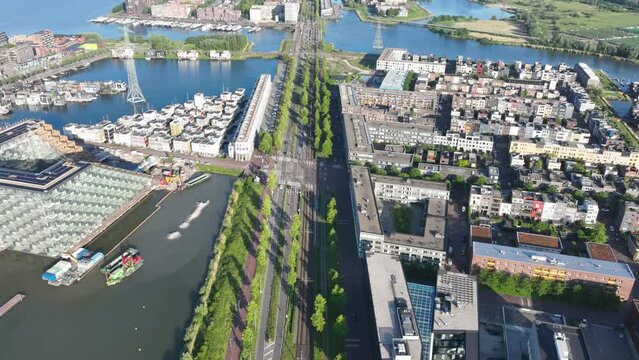 Hyperlapse of Amsterdam Ijburg artificial island modern residential area smart city cityscape at water Ijmeer. Urban houses buildings city environment area. Timelapse