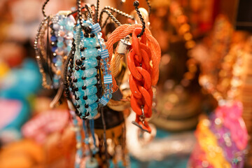 Women jewelry market. a lot of colourful jewerly in the store