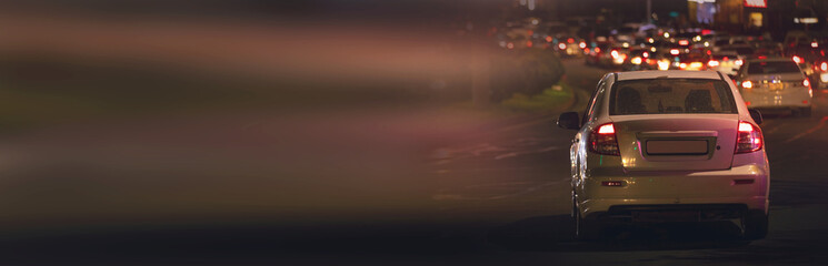 Car at the night city. Traffic