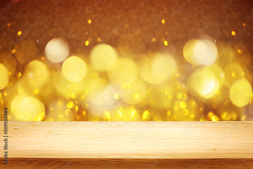Poster empty wood table top on golden bokeh abstract background for montage products display new year,chris