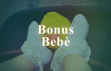 Picture of cute feet of a new born, with the sign 