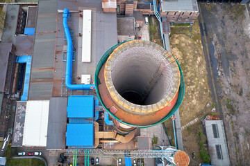Coal power plant after decommissioning. Aerial, vertical view inside the chimney of a power plant....