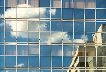 Sky and Clouds reflected in office windows 