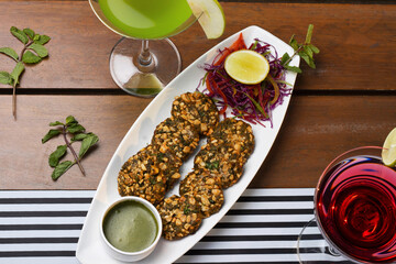 Gulmaru Kebab with red and green cocktail, Pune