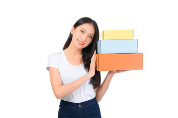 Fototapeta premium Happy cute asian woman smiling and holding package online marketing and delivery Start a small business at home on white background, Delivery shipping service concept.
