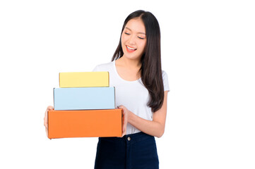 Fototapeta premium Happy cute asian woman smiling and holding package online marketing and delivery Start a small business at home on white background, Delivery shipping service concept.