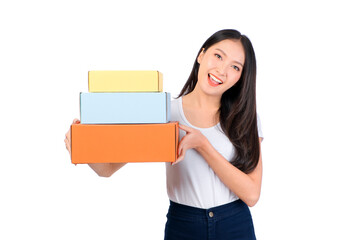 Happy cute asian woman smiling and holding package online marketing and delivery Start a small business at home on white background, Delivery shipping service concept.