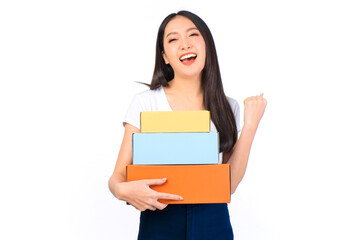 Fototapeta premium Happy cute asian woman smiling and holding package online marketing and delivery Start a small business at home on white background, Delivery shipping service concept.