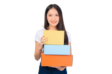 Naklejka premium Happy cute asian woman smiling and holding package online marketing and delivery Start a small business at home on white background, Delivery shipping service concept.