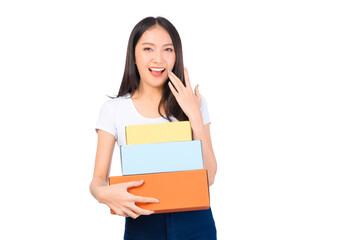 Happy cute asian woman smiling and holding package online marketing and delivery Start a small business at home on white background, Delivery shipping service concept.