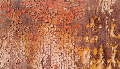 Rusty metal wall texture with peeling paint and scratches