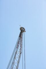detail of a crane on a blue sky background