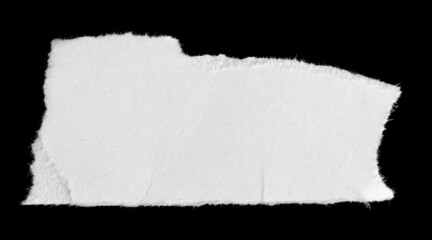 a white piece of paper on a black isolated background