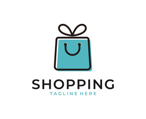 Shop Logo design with shop bag combined with smile icon symbol design