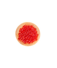 Top view of wooden mini plate with red caviar isolated on white background.