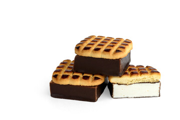 Shortbread cookies with souffle in chocolate glaze Ptichye moloko isolated on white background.