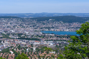 Aerial view of City of Zürich and Lake Zürich seen from local mountain Uetliberg on a sunny spring day. Photo taken May 18th, 2022, Zurich, Switzerland.