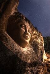 Sculptures carved in sandstone on the Ruta de las Caras, is a hiking route on the banks of the Buendia reservoir, Cuenca, Spain.