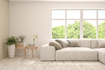 Fototapeta premium White living room with sofa and summer landscape in window. Scandinavian interior design. 3D illustration