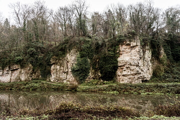 Fototapeta na wymiar lake through the landscape with rocks