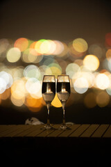 Fototapeta na wymiar 夜景とワイングラス