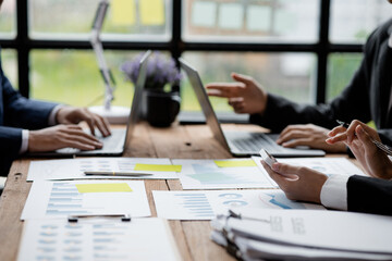 Business man group are meeting together in the office, they are meeting on the topic of finance and financial management, they are business partners. Concept financial management for startup companies