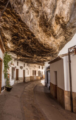 Streets and houses under the mountain of Setenil de las Bodegas, Cadiz.