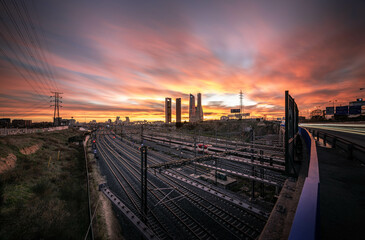 Magical sunset over the access railways to the Chamartin station, Madrid.