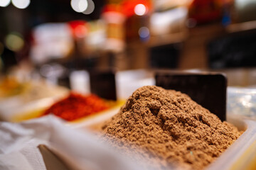 Colorful spices at a market for sale, close up