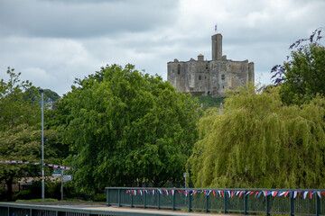 View of medieval Warkworth Castle from afar 