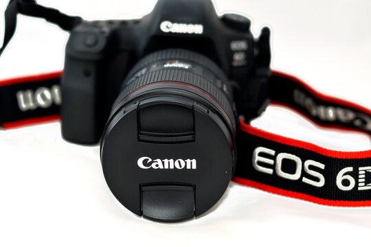 Cairo, Egypt, May 31 2022: Front view of Canon EOS 6D Mark II full frame DSLR digital camera body with Canon Lens EF 24-105mm USM, selective focus of Canon EOS 6D Mark 2 isolated on white background