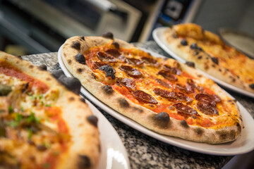 Margherita, roasted vegetable cheese and pepperoni pizza