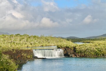 Fototapeta premium waterfalls of the la Madeleine in the Plaine des Lacs nature reserve, New-Caledonia island, France