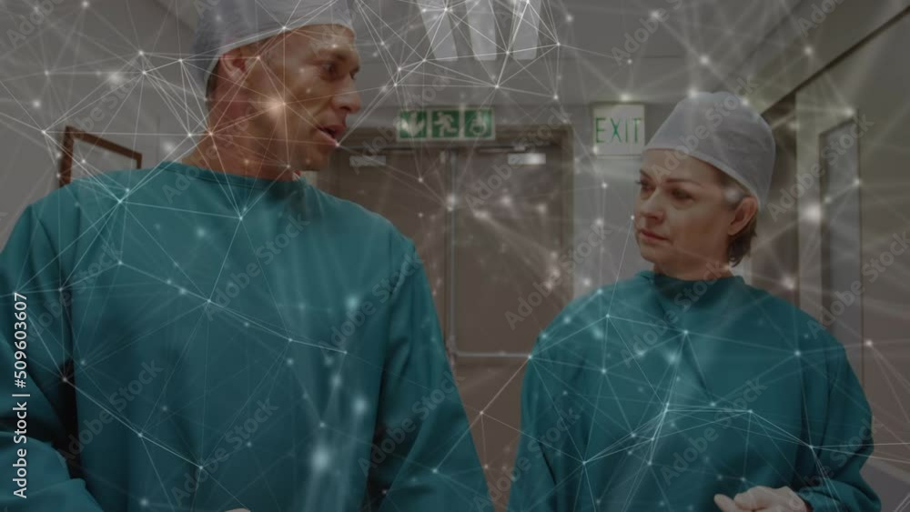 Poster animation of network of connections over two caucasian surgeons in operating theater
