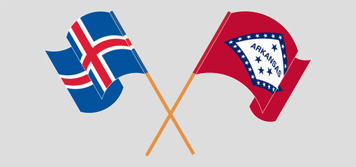 Crossed and waving flags of Iceland and The State of Arkansas