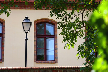 Colorful historical buildings and vintage street lantern in central Zagreb, Croatia.