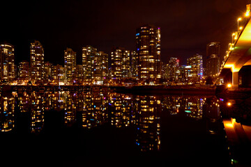 Cambie Bridge and Yaletown Lights Vancouver. The view of Yaletown across False Creek at night...