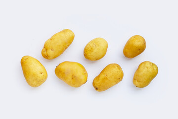 Fresh patatoes on white background.