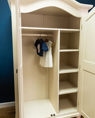 Wardrobe after painting and renovation in creamy color