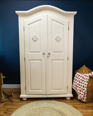 Wardrobe after painting and renovation in creamy color