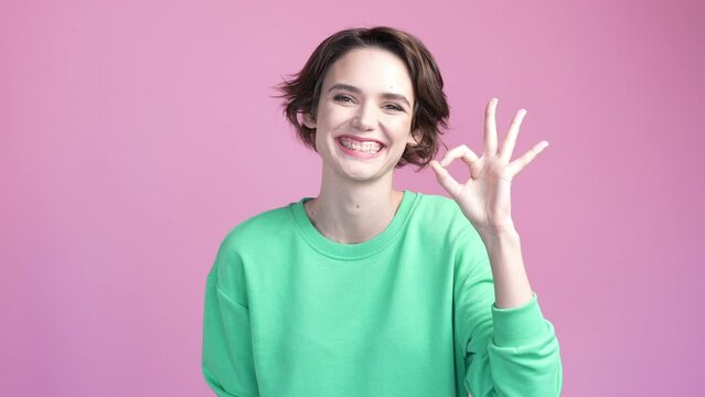Lady make okay sign offer good ads isolated pastel color background