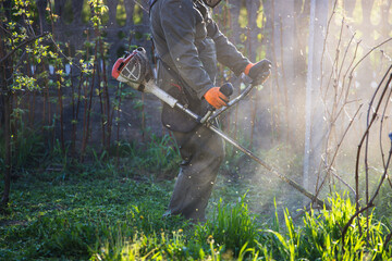 Lawn mover on green grass. Machine for cutting lawns.