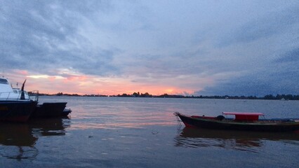 boats at sunset