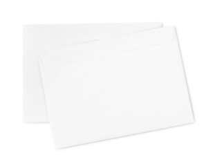 Two letters on white background, top view