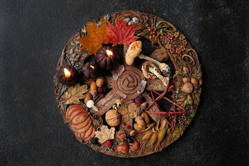 witch altar for Samhain sabbat, wiccan wheel of the year on abstract dark background. magic esoteric ritual. Mysticism, divination, wicca, occultism, Witchcraft concept. Halloween holiday. top view - obrazy, fototapety, plakaty