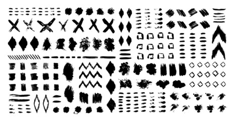 Grunge design elements set. Grunge shapes collection for patterns or backdrops. Paint stains and brush strokes. Tribal ethnic style. Grungy ink spots and drops.